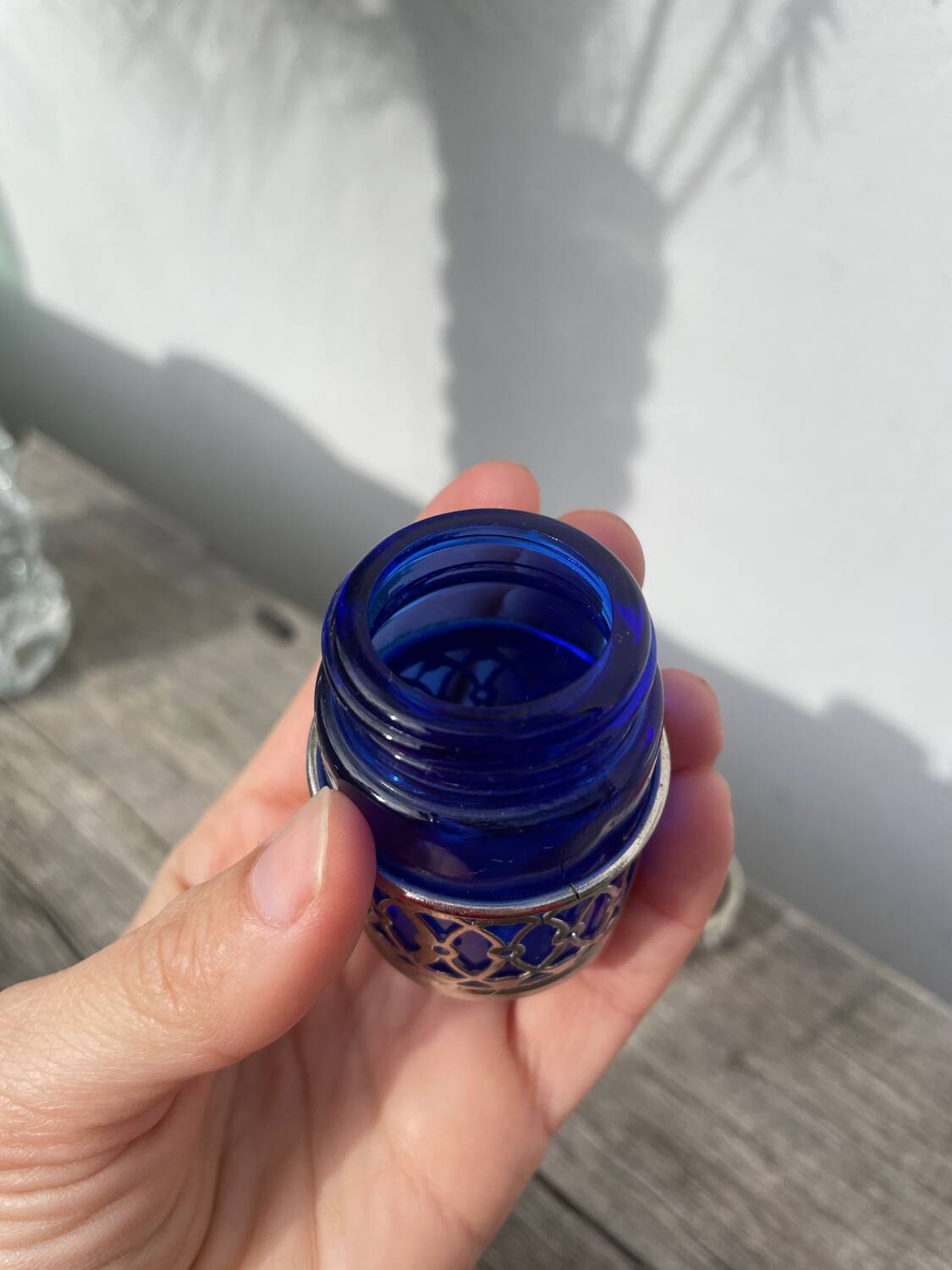 Silver-plated metal and blue glass salt and pepper shaker