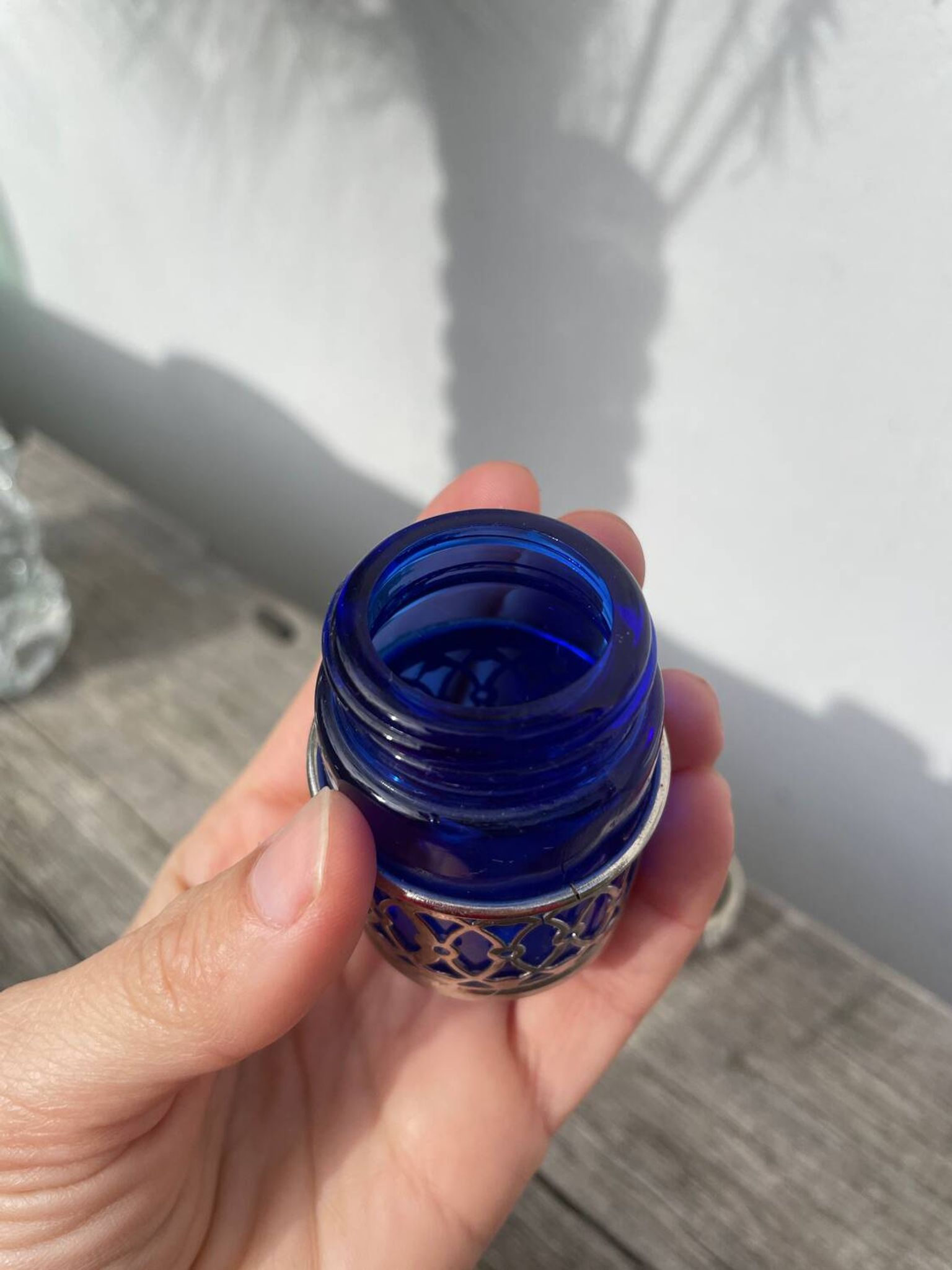 Silver-plated metal and blue glass salt and pepper shaker