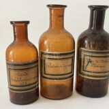 3 amber apothecary bottles