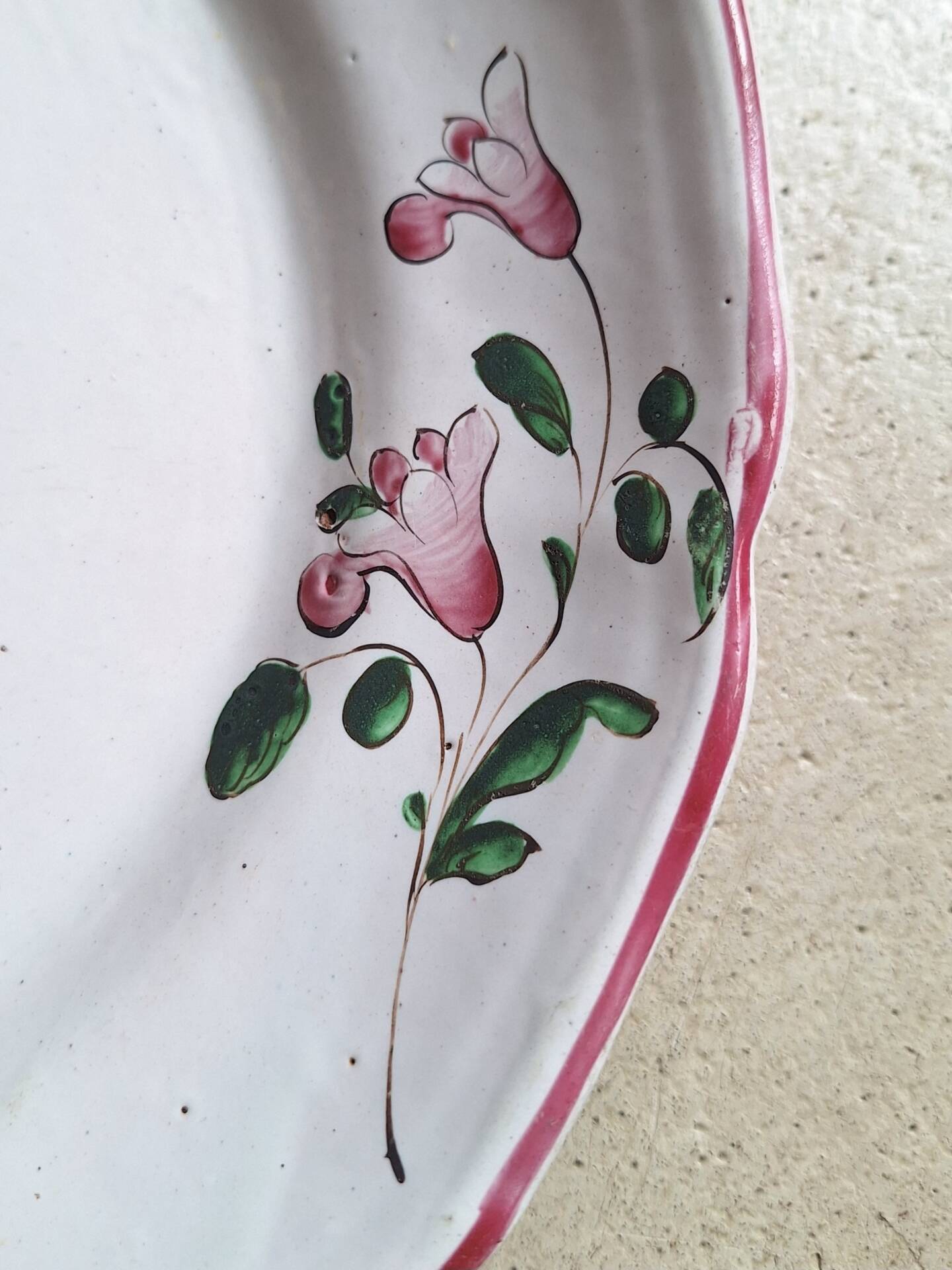 Hand-painted earthenware plate from eastern France, 18th century.