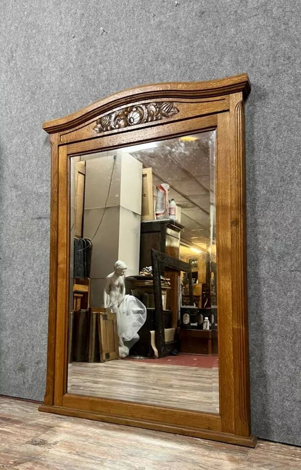Large Art Deco period mirror in carved oak circa 1930