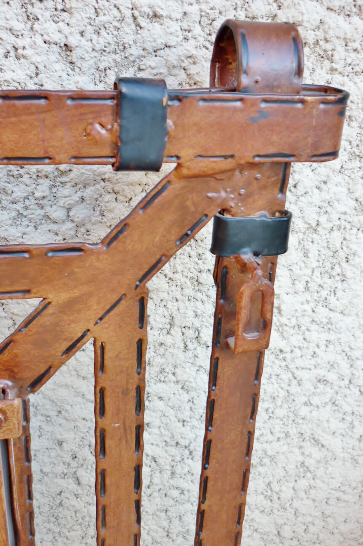 Metal mirror, wrought iron imitation leather straps and horse harness