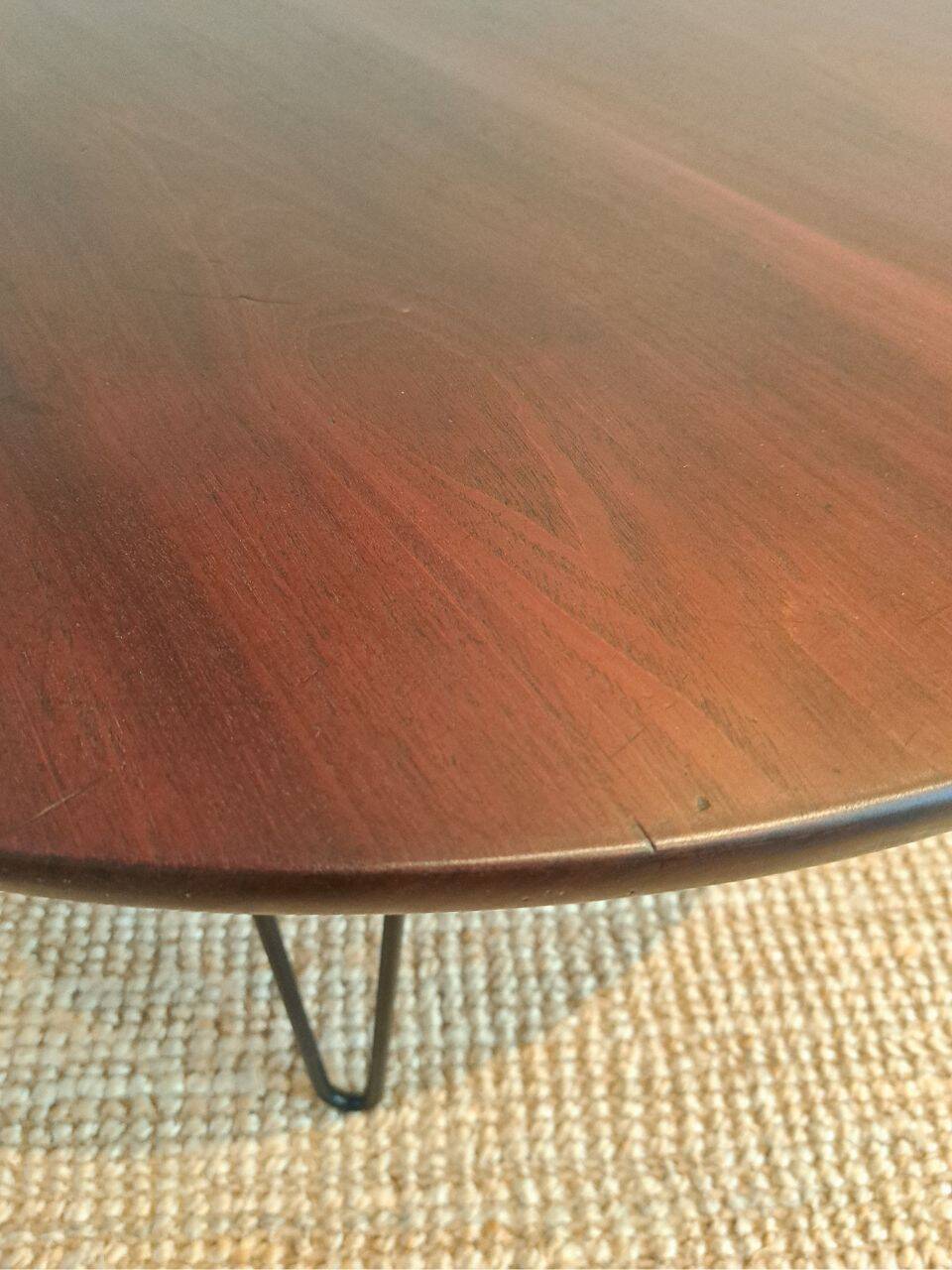 Round coffee table with mahogany wood top