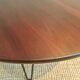 Round coffee table with mahogany wood top