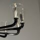 Venetian chandelier in Murano glass in black and colourless, 12 light arms, circa 1990.