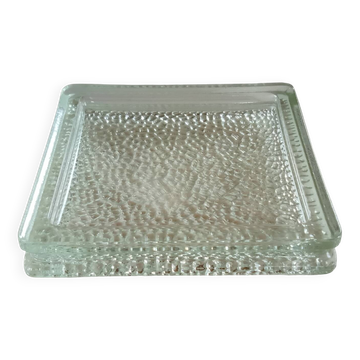 Glass block pocket emptier