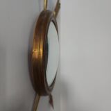 Curved brass witch's mirror