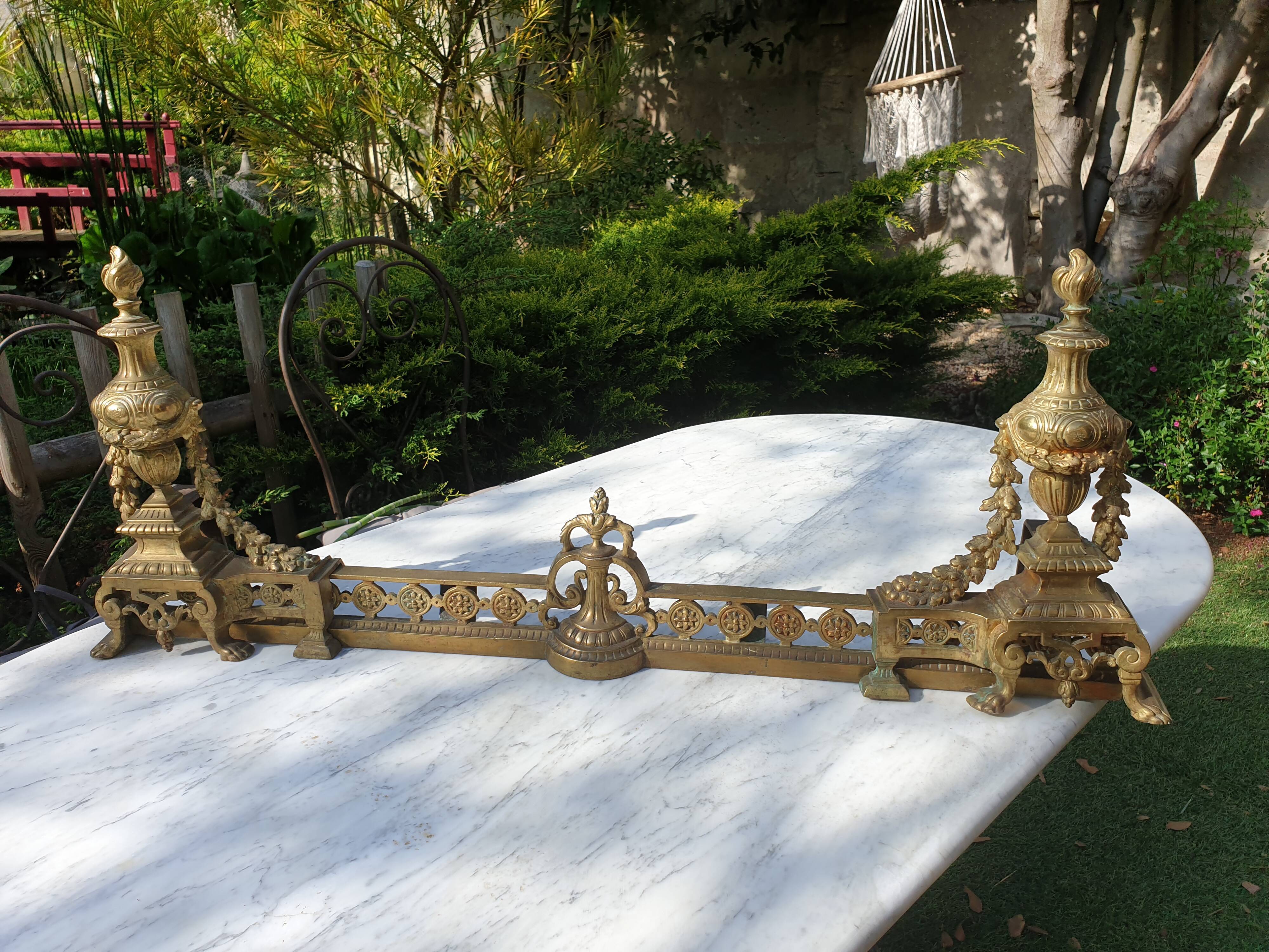 Chenêts and chimney bar in bronze nineteenth century.