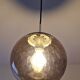 Smoked glass ball pendant light by Raak 1970