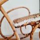 Cane rocking chair and upholstered seat
