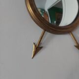 Curved brass witch's mirror