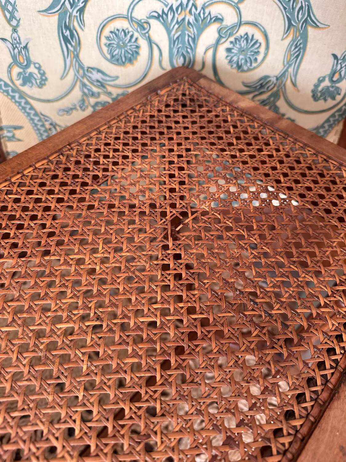 Piano bench seat in cane