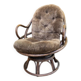Fauteuil pivotant en rotin et coussin velours marron années 70