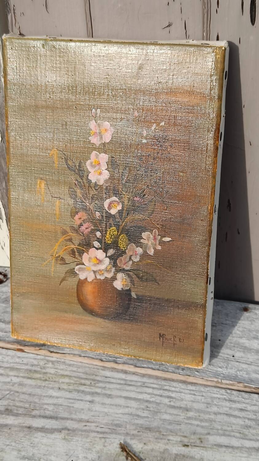 Canvas painting of a bouquet of flowers.
