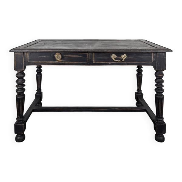 Bureau de style Louis XIII en bois noirci pieds tournés deux tiroirs