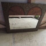 framed mirror with bird motif