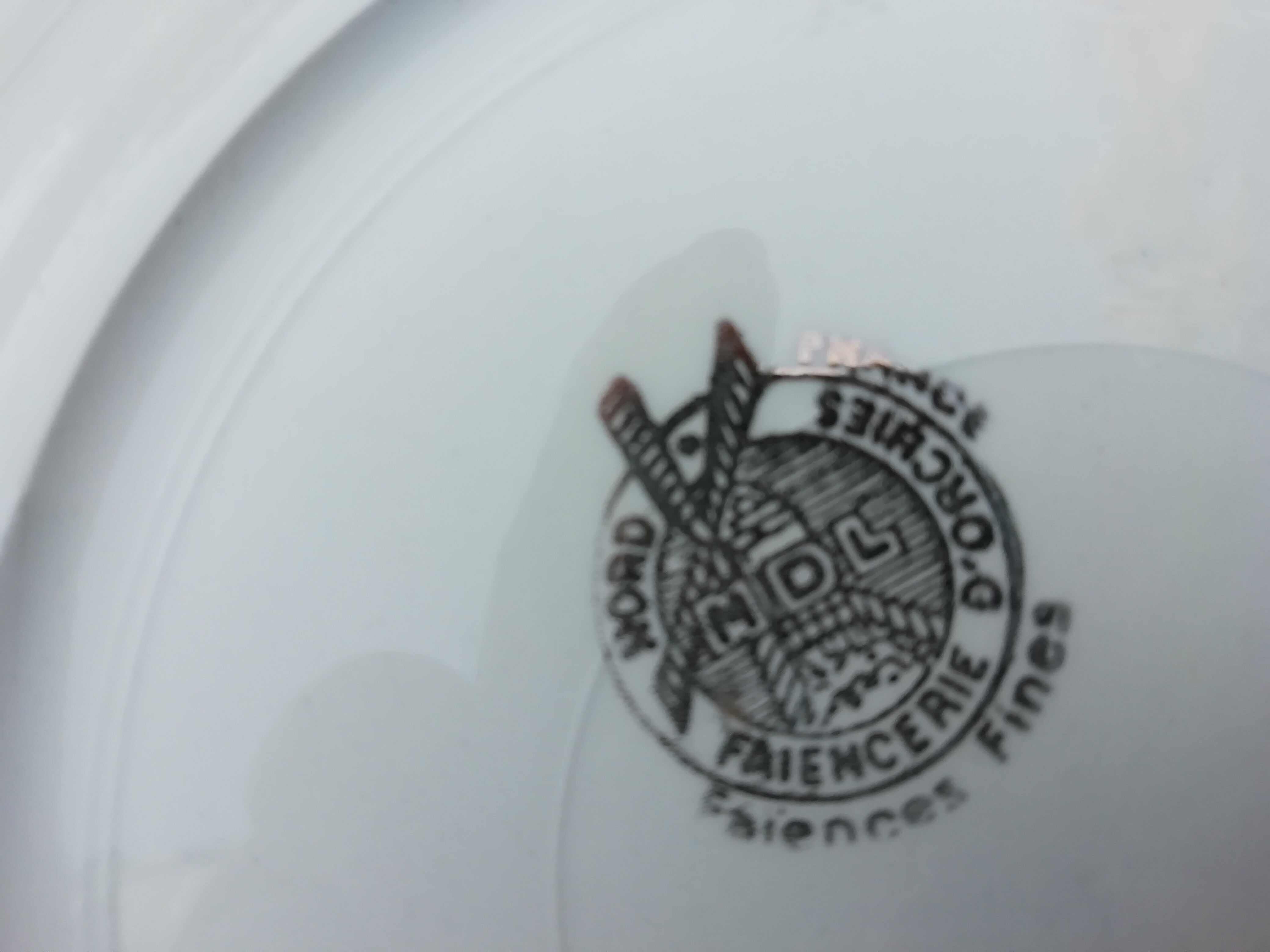 11 yellow earthenware plates from North Orchies