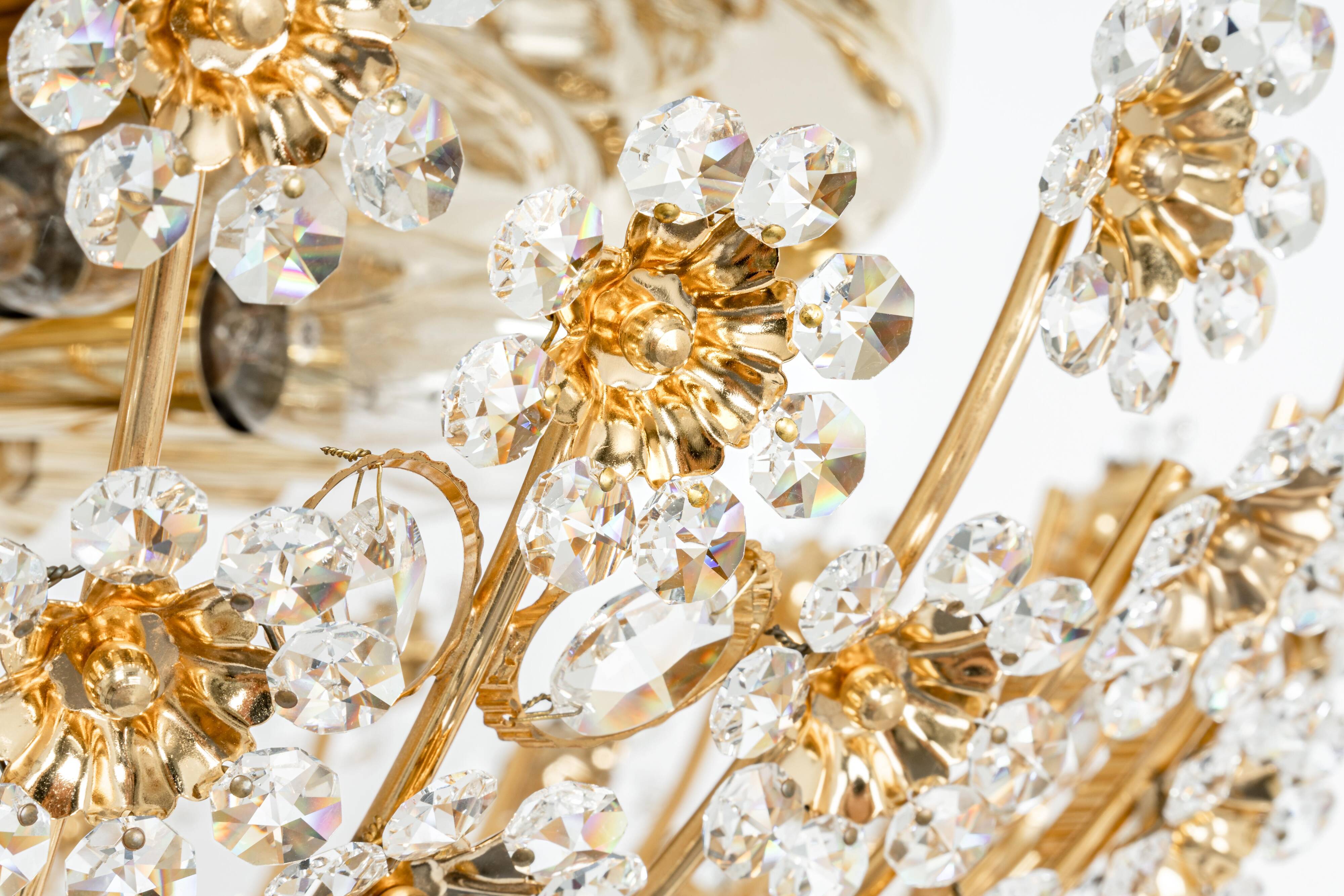 Small delicate ceiling light in gilded brass and cut glass in the shape of flowers by Palwa, Germany, 1970s.