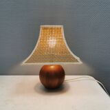 Very rare table lamp in turned teak wood with original braided shade. 1970s