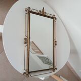 Vintage Hollywood Regency mirror from the 1950s.