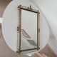 Vintage Hollywood Regency mirror from the 1950s.