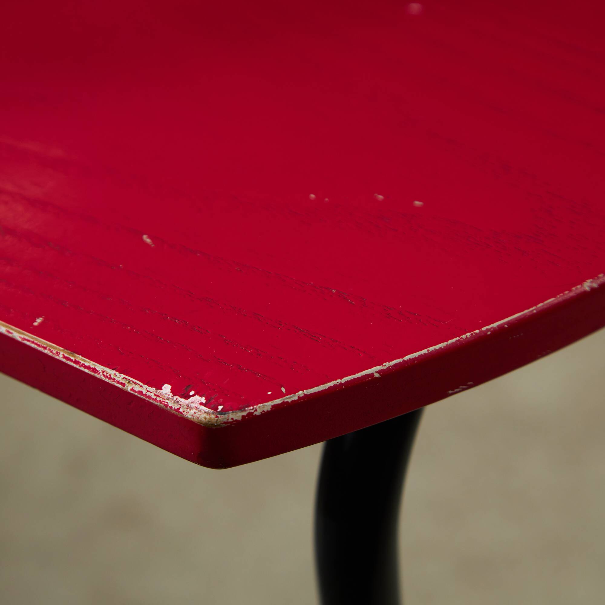 Red Plywood and Curved Metal Frame Chair
