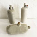 Trio of stoneware hot water bottles, three models