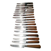 Old table knives and dessert knives, wooden handles, stainless steel blades