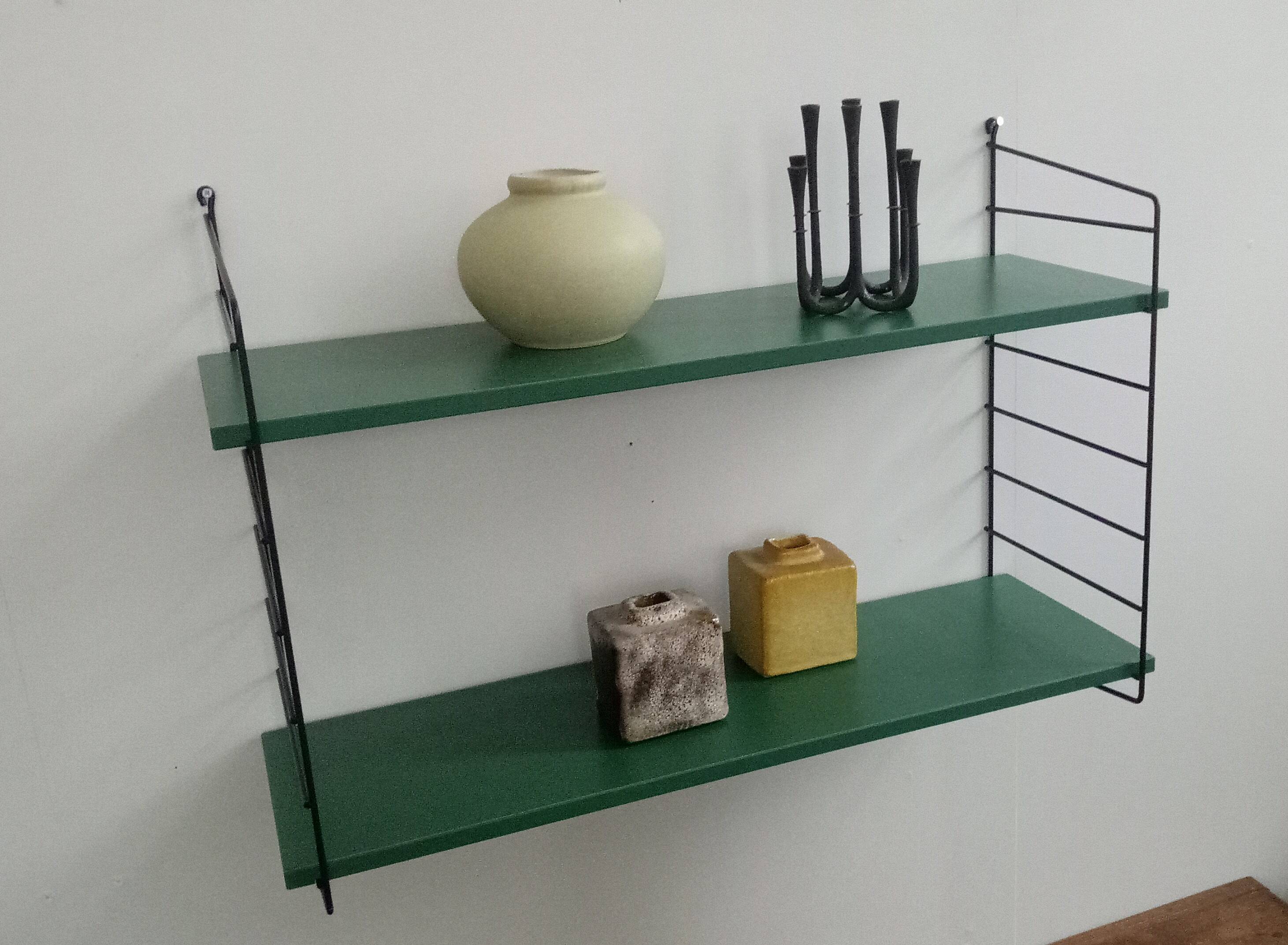 Wall shelf unit in blue from the 70s