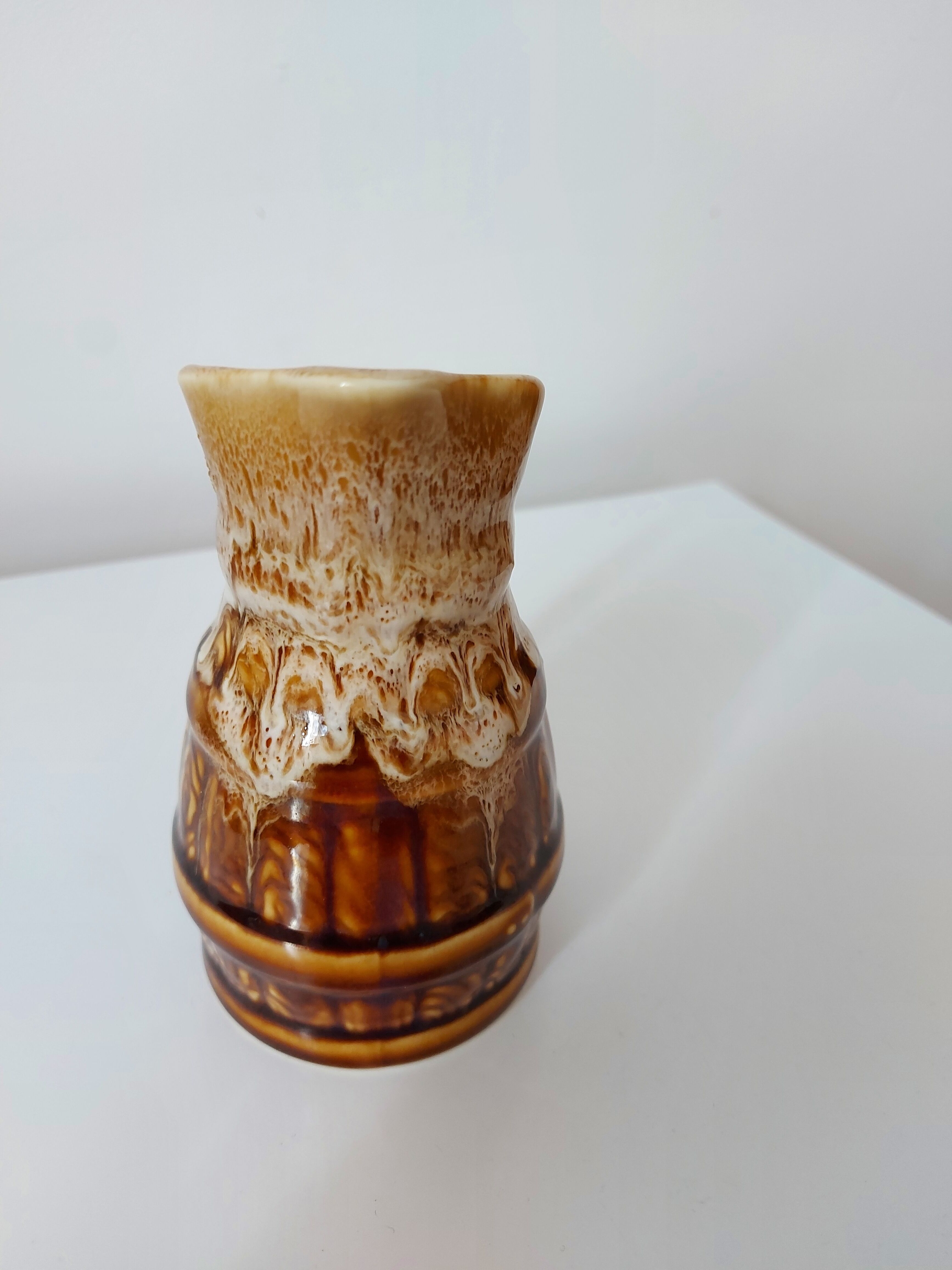 Vintage pitcher revol