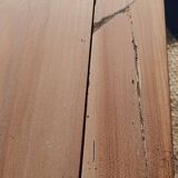 Low farmhouse table in raw wood