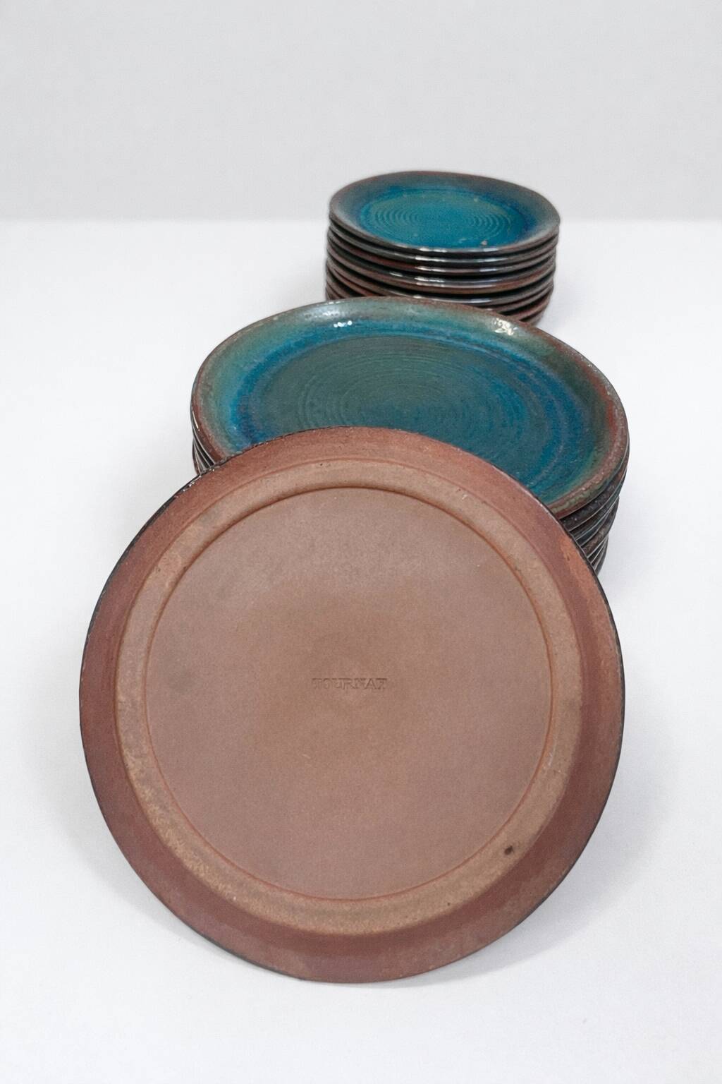 Set of 6 stoneware plates signed Tournay – Turquoise glaze – Vintage years
