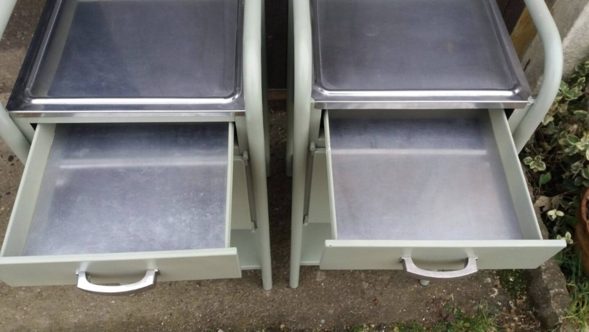 Pair of metal bedside tables from the 1950s.