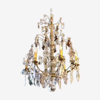 Large chandelier with tassels and old daggers