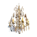 Large chandelier with tassels and old daggers
