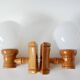 Pair of globe wall lights in pine and opaline from the 60s