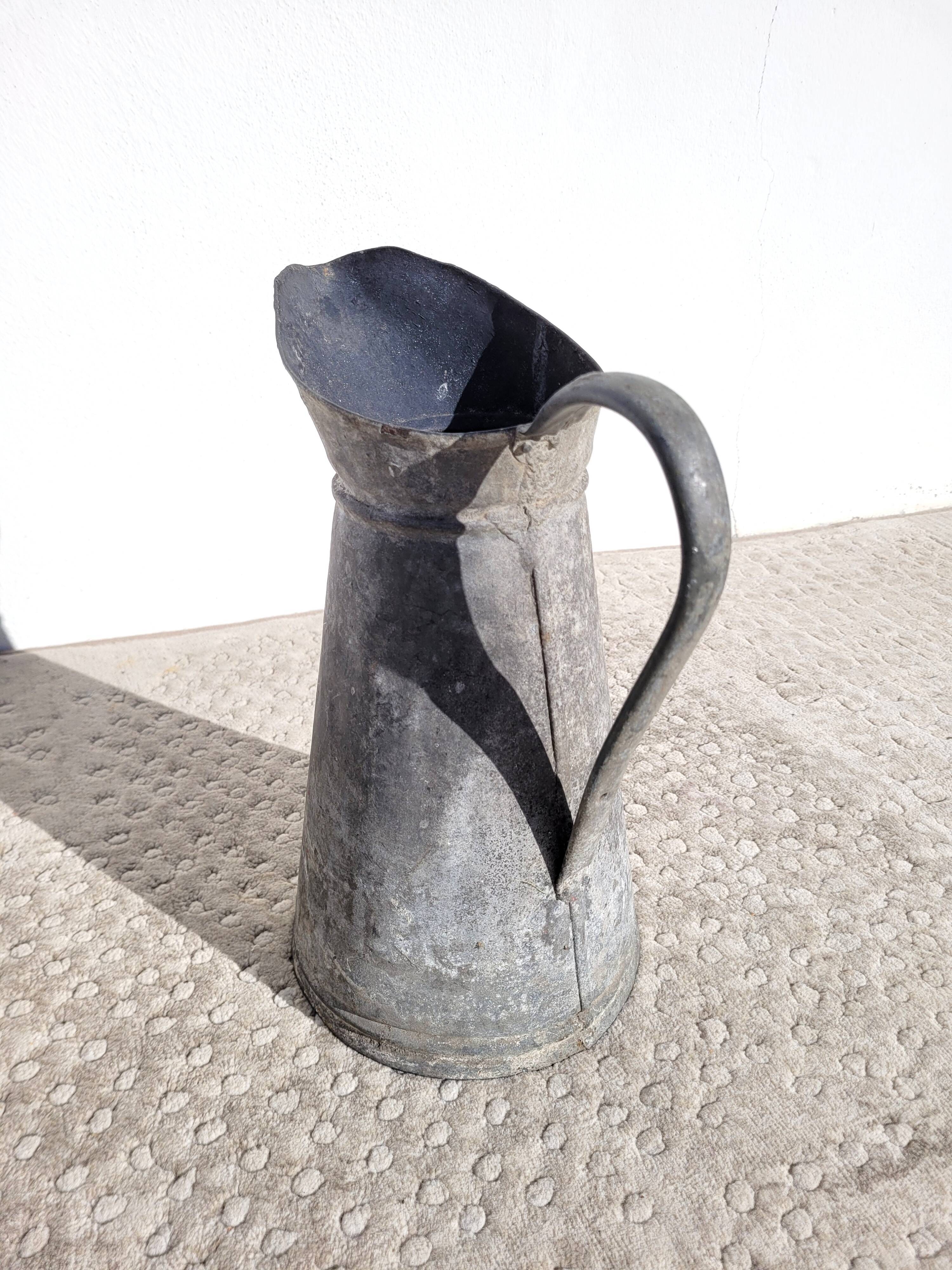 Old vintage zinc pitcher