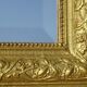 Antique mercury mirror in the Napoleon III style.