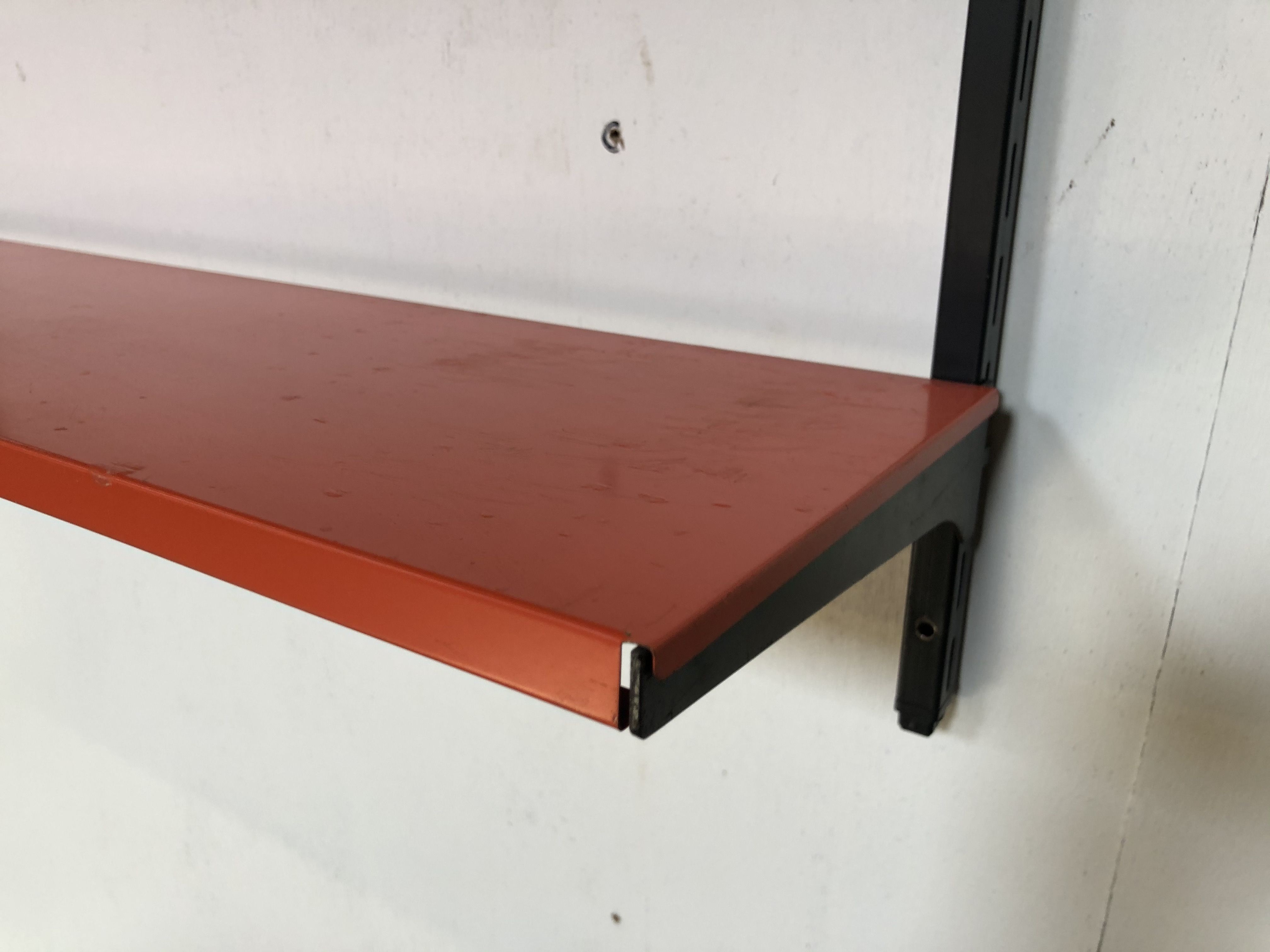 Tomado Holland vintage wall support black steel orange from the 1970s