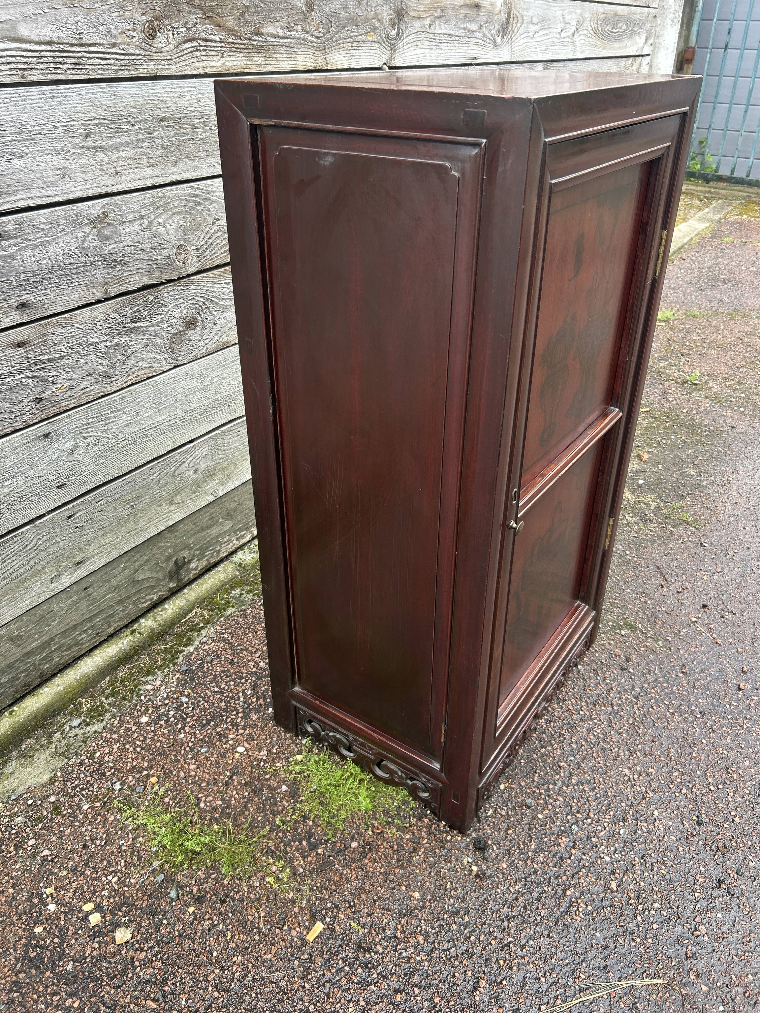 Small cabinet with one door, Indonesian.