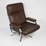 A pair of leather armchairs, 1970s