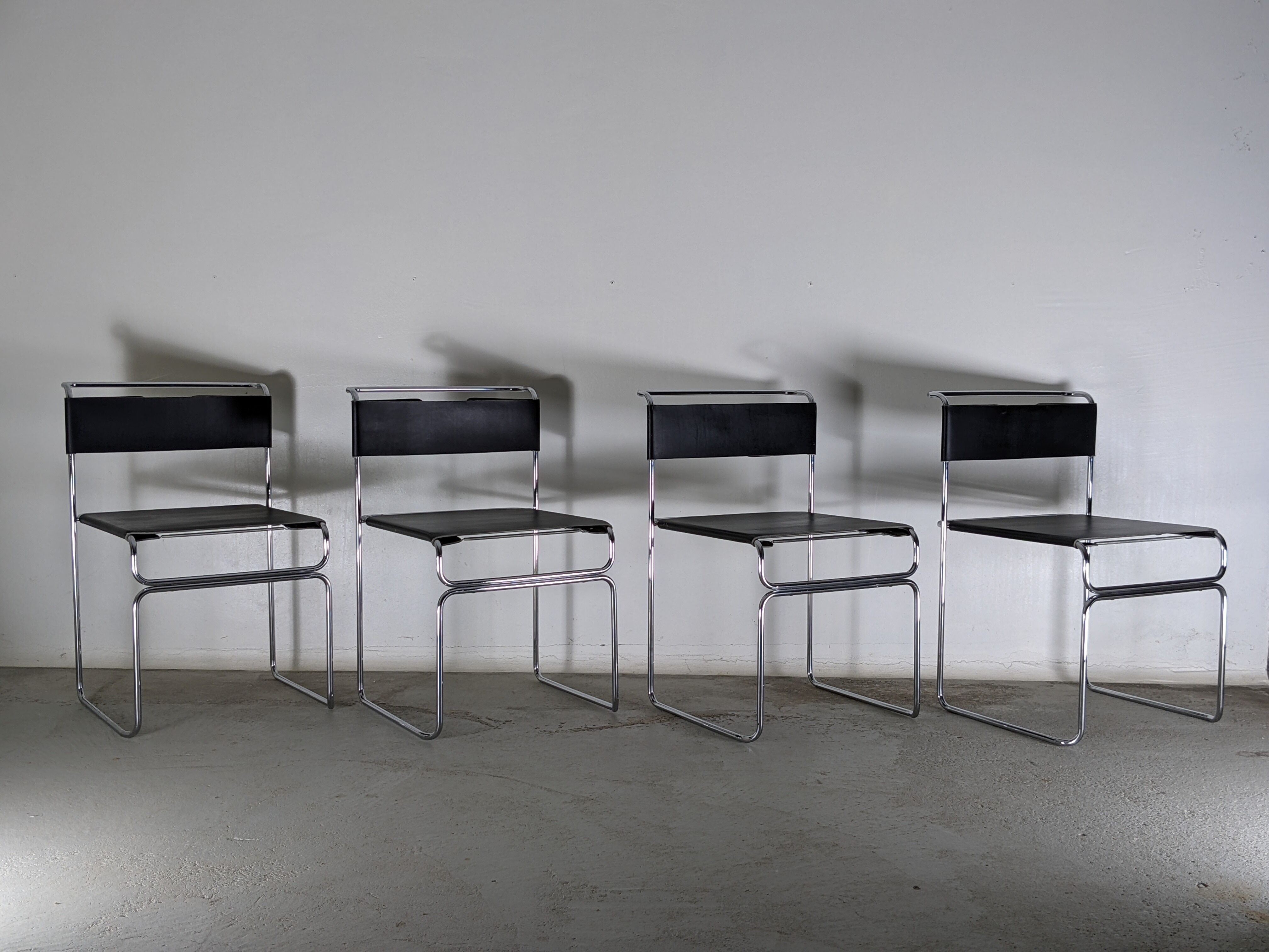 Suite of 4 chairs in chromed metal and leather by Giovanni Carini for Planula - 70s