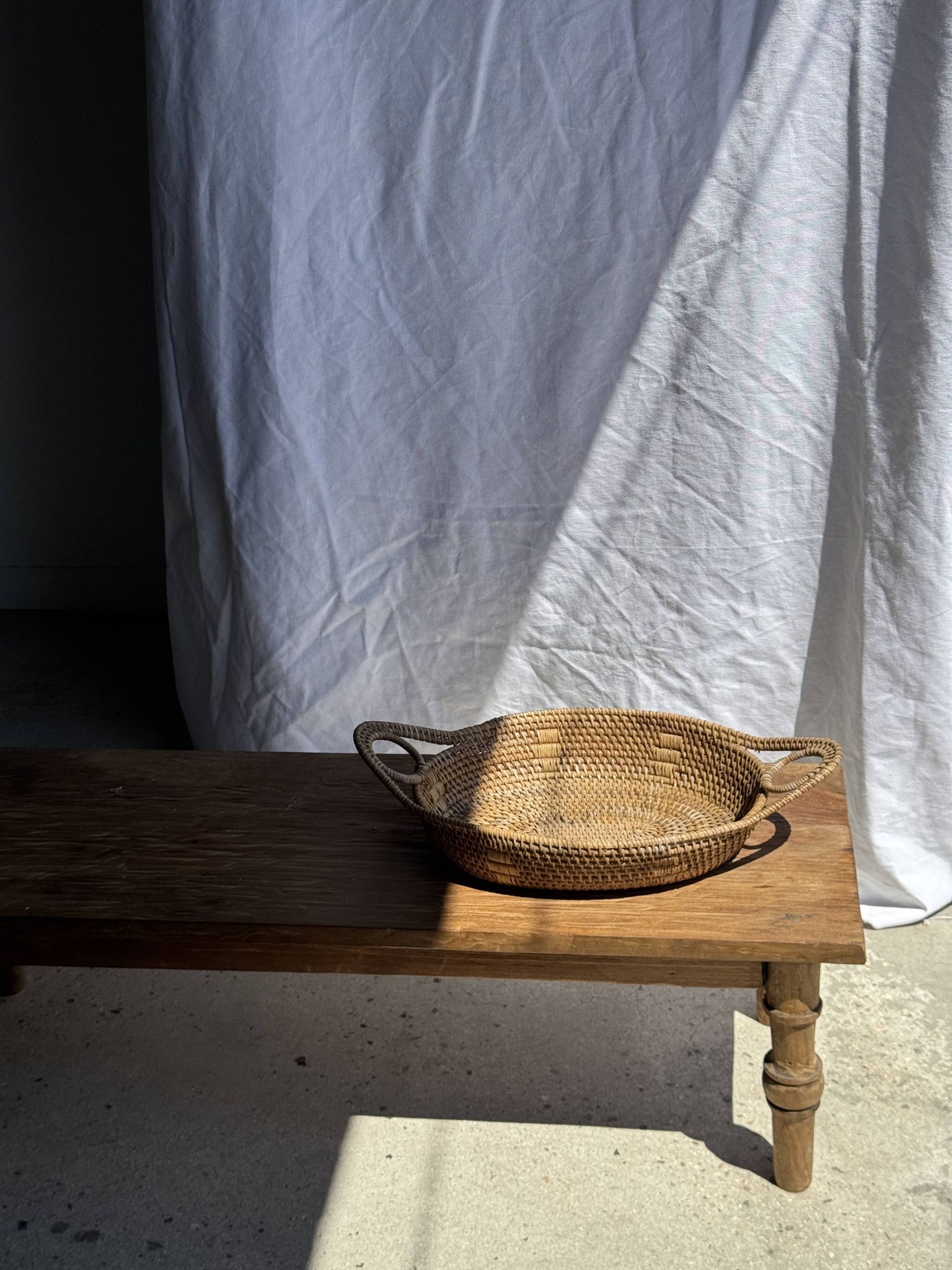 Large flat oval woven rattan basket with handles, Indonesian L53x64