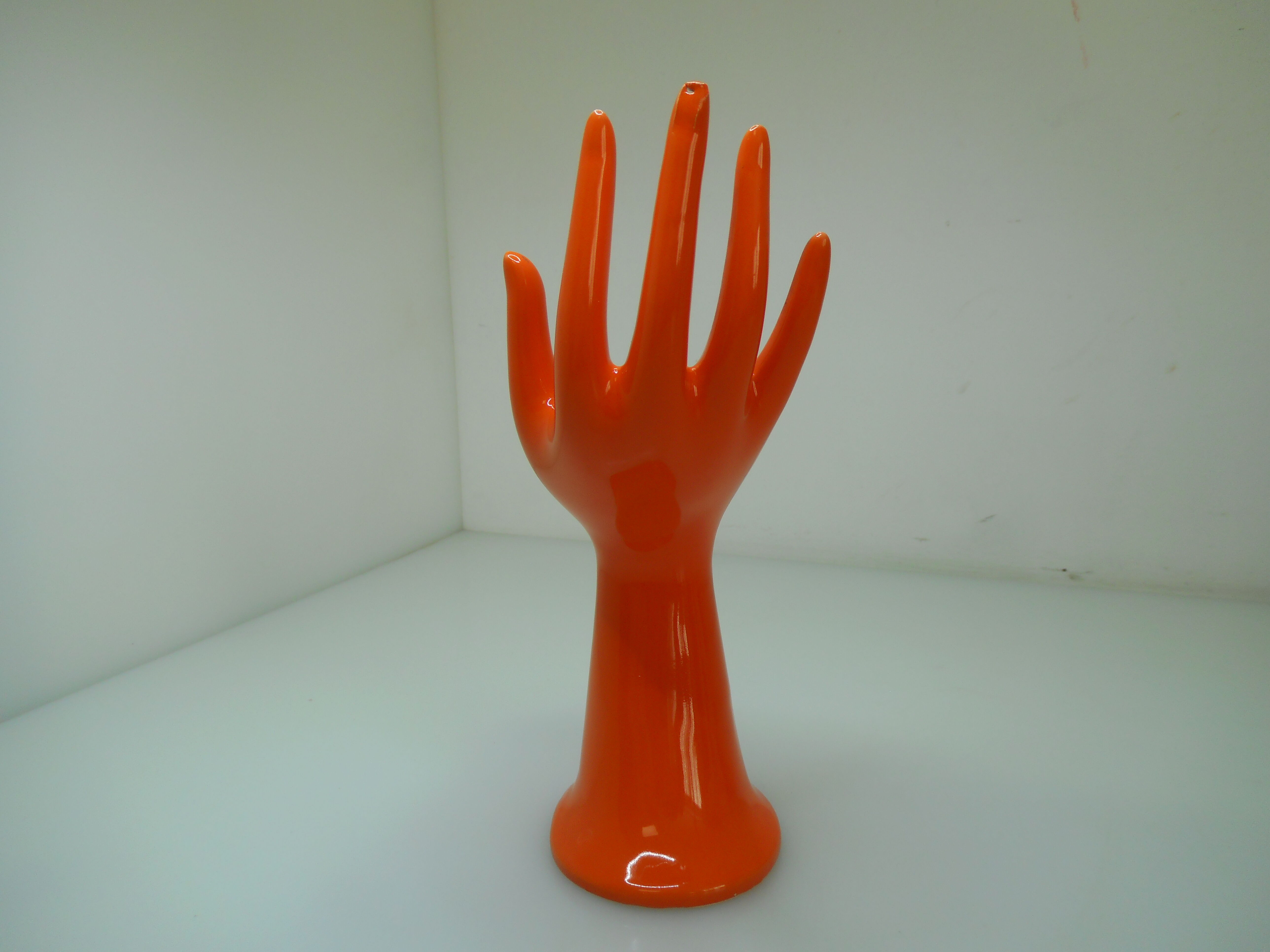 Vintage orange ceramic hand
