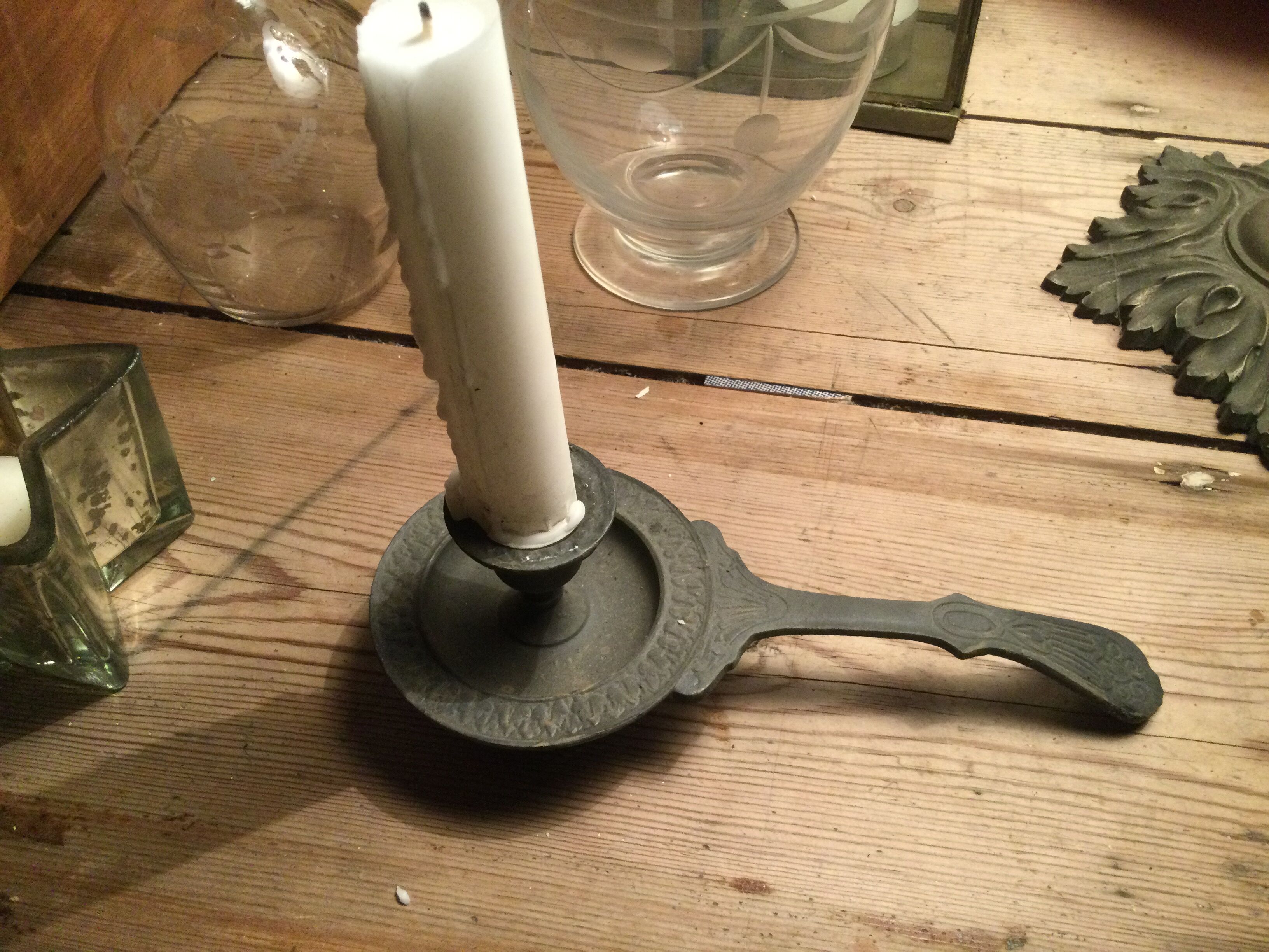 Pair of cast iron candle holders