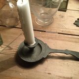 Pair of cast iron candle holders