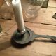Pair of cast iron candle holders