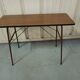 Folding table in formica brown console