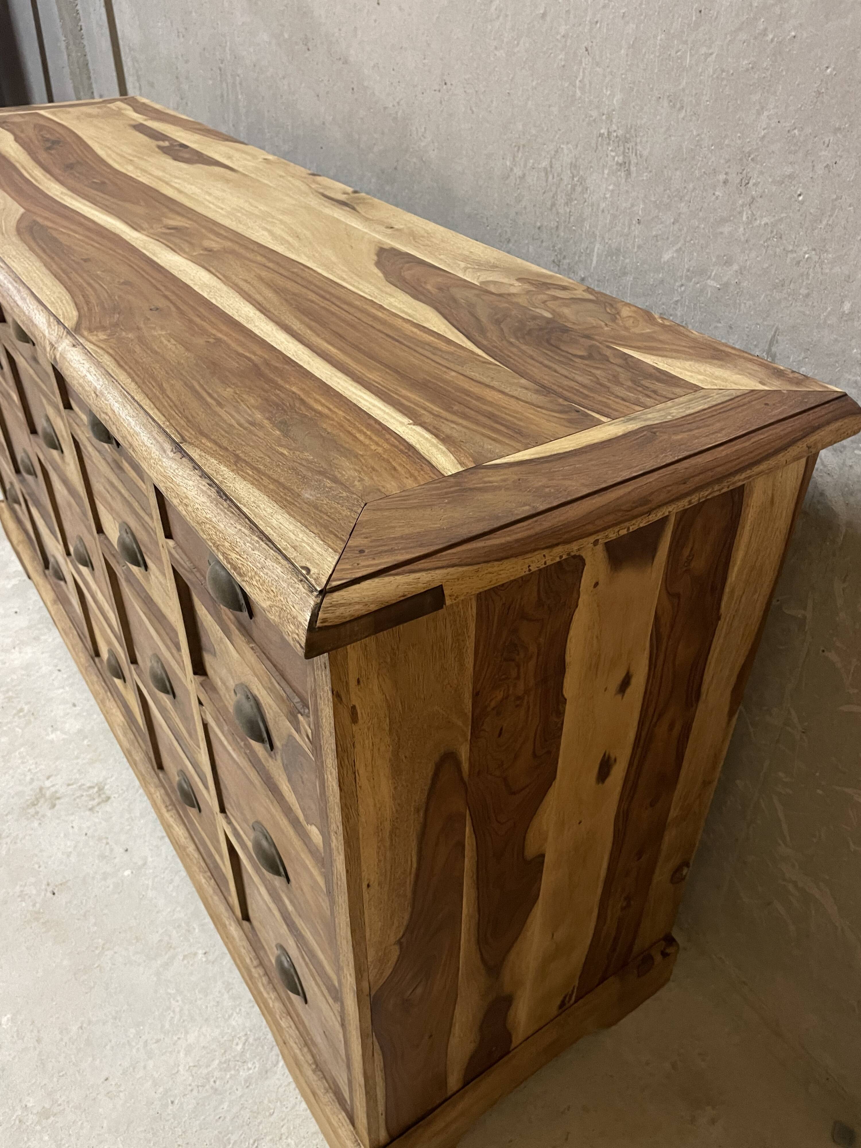 Transformed workshop furniture with 20 drawers.