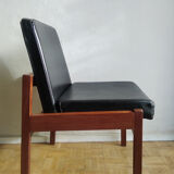Massive teak and black skai armchair from the 1960s